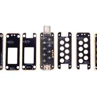 An image showing all seven individual PCBs laid out side-by-side, demonstrating the separate layers before assembly.