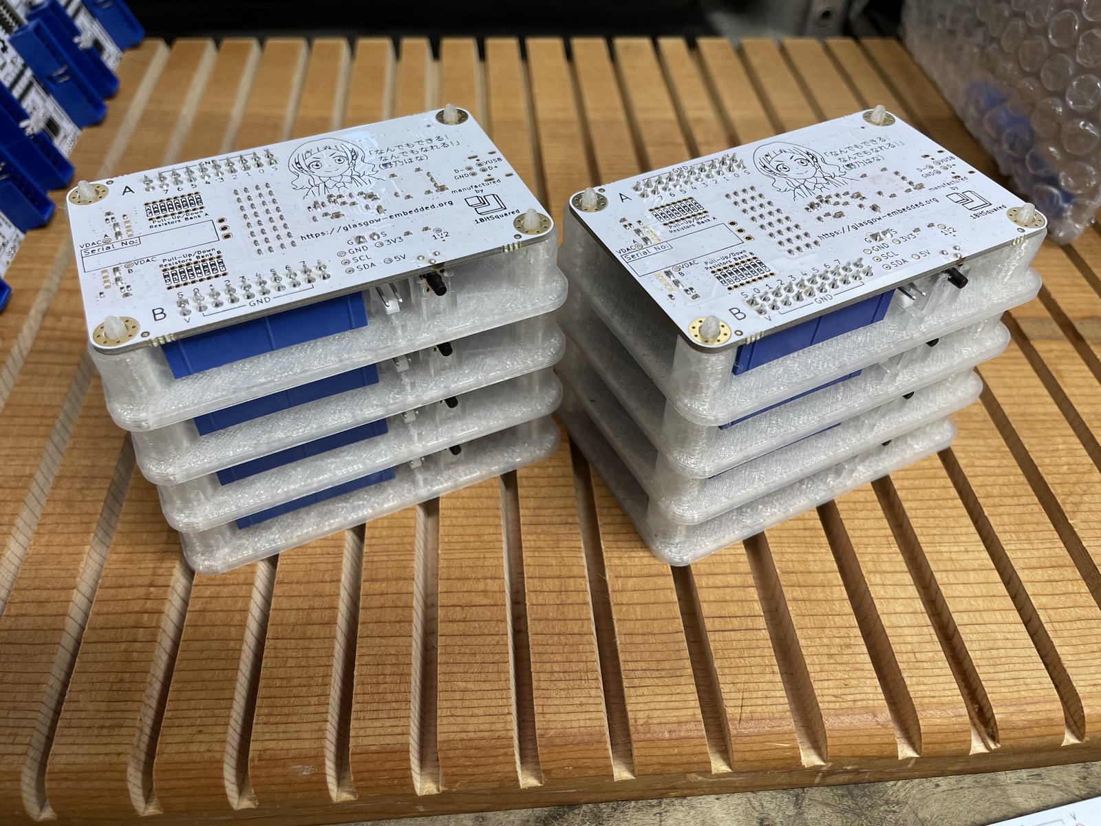 Hand soldered Glasgows on connector alignment jigs