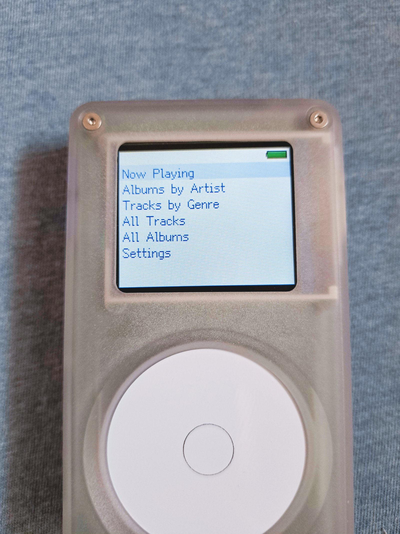 Photo of a Tangara with blue text