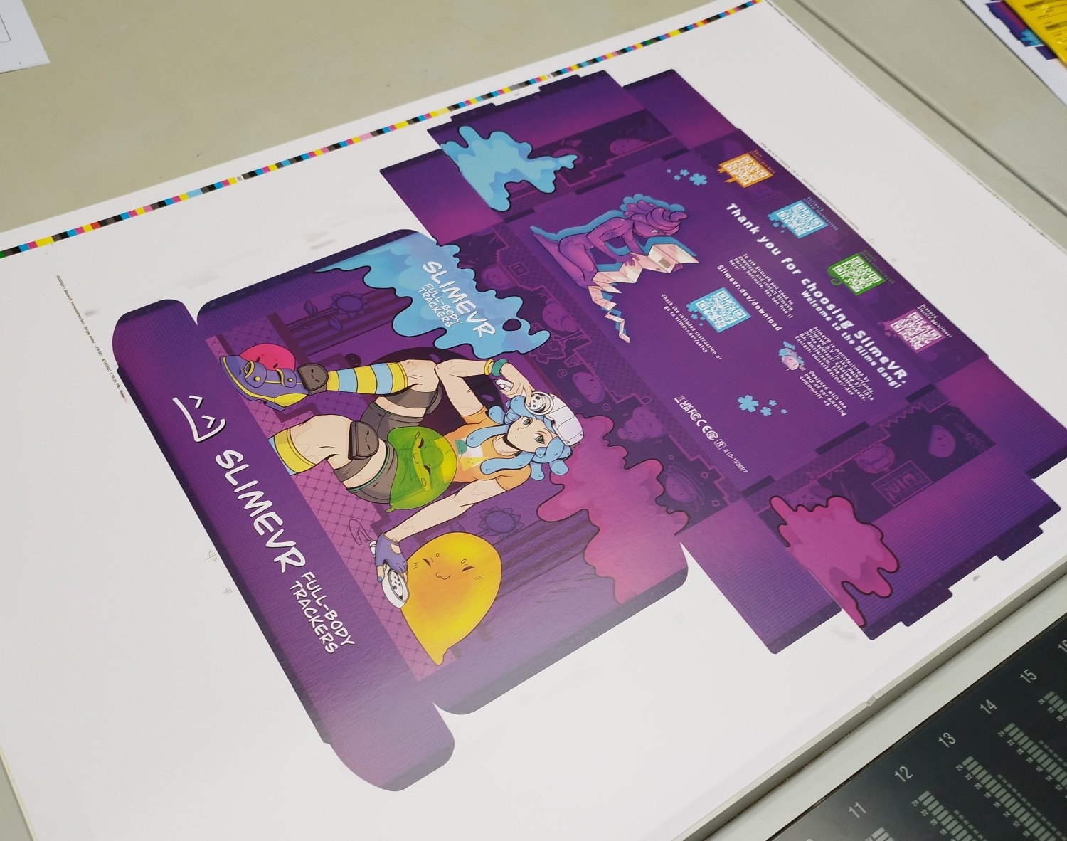 Photo of the first print of the box that we took at the factory to check the colors