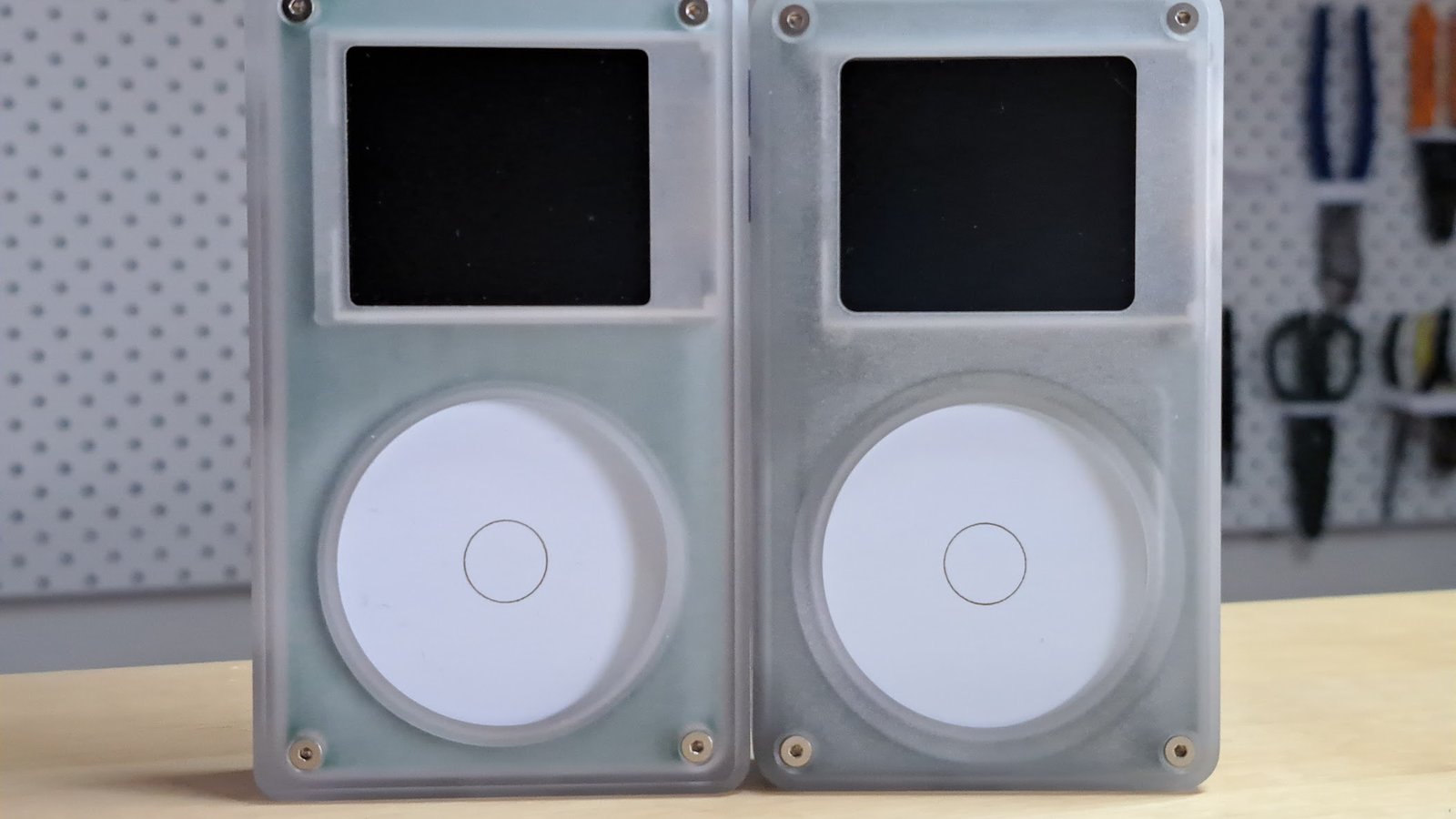 Our old CNC prototype (left) next to the new one (right)