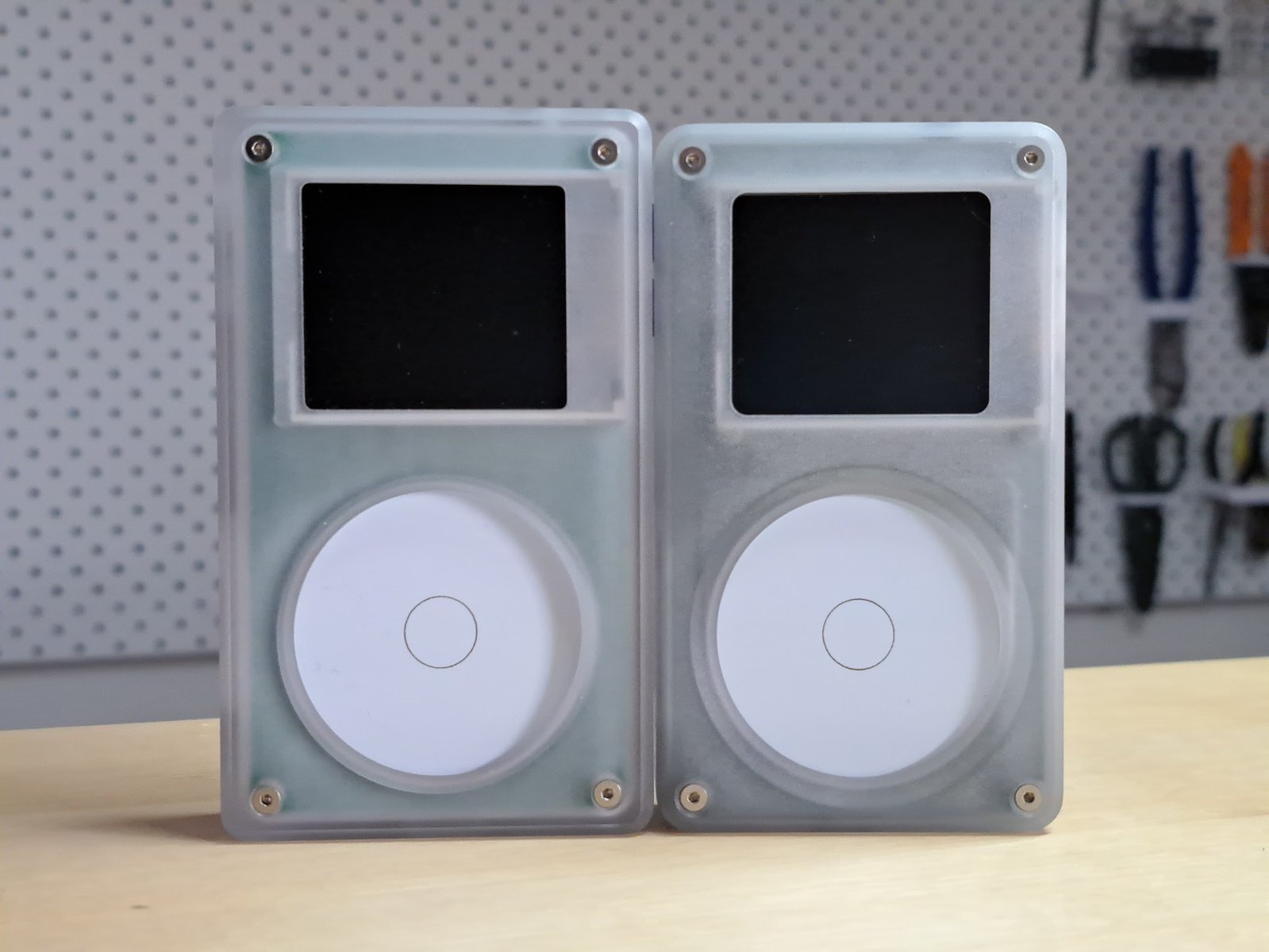 Our old CNC prototype (left) next to the new one (right)