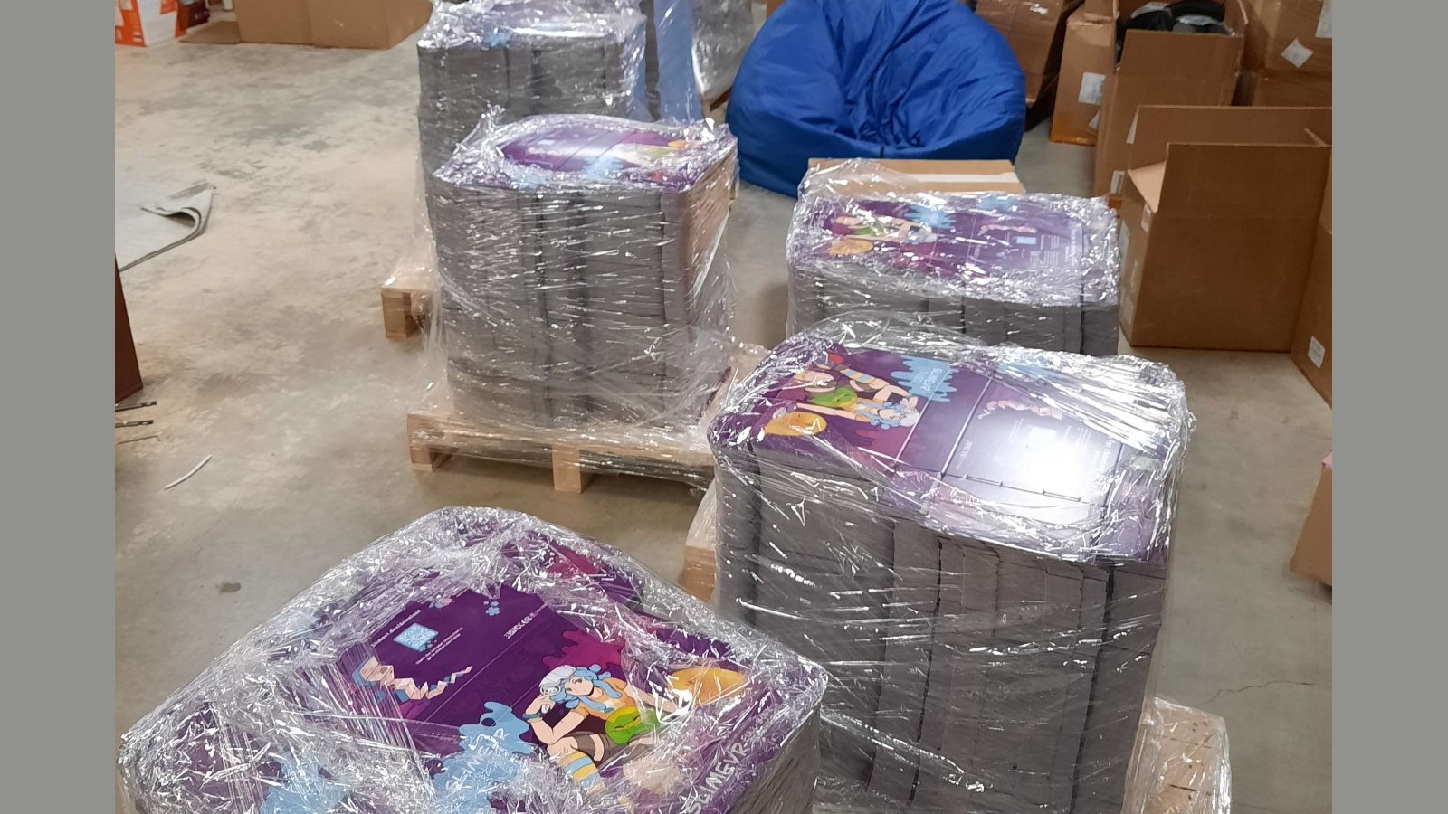 Disassembled SlimeVR Boxes awaiting to be put together