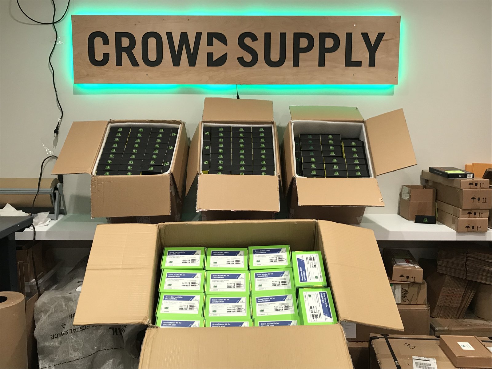 LimeSDR Minis and Grove Starter Kits in the Crowd Supply warehouse.