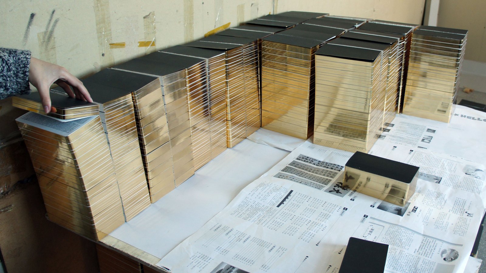 Stacks of books with gleaming, gilded edges