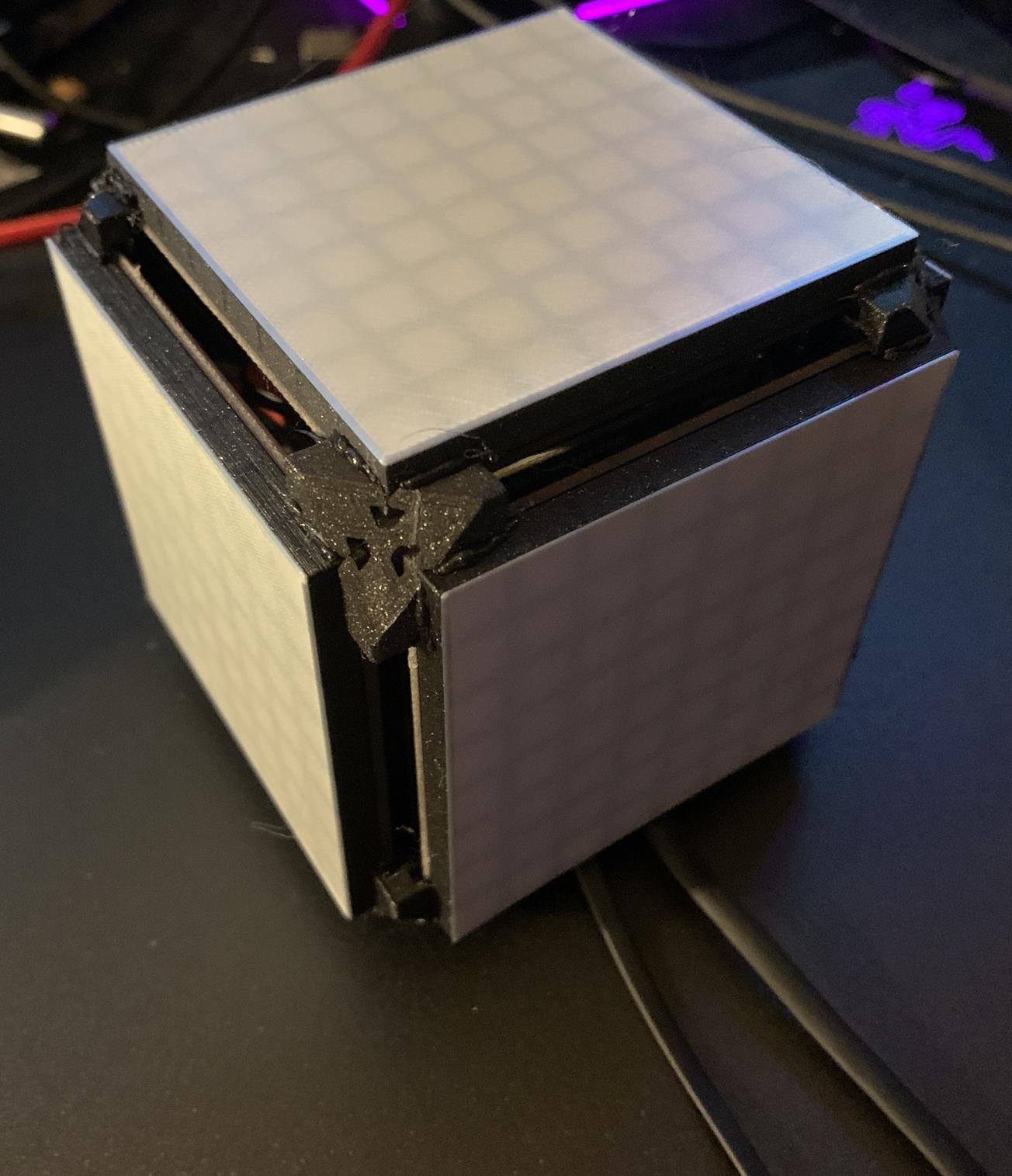 assembled cube of panels