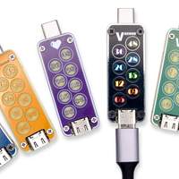 An image showing 7 units of USB VSense arranged together, each sporting a different faceplate color, material, or style. 