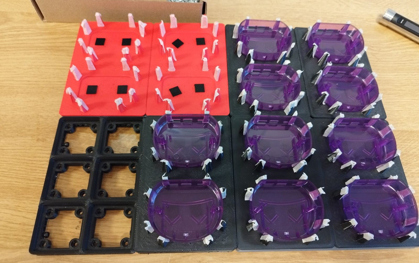 The cases are put in a special assembly jig (we are making way more of them!)