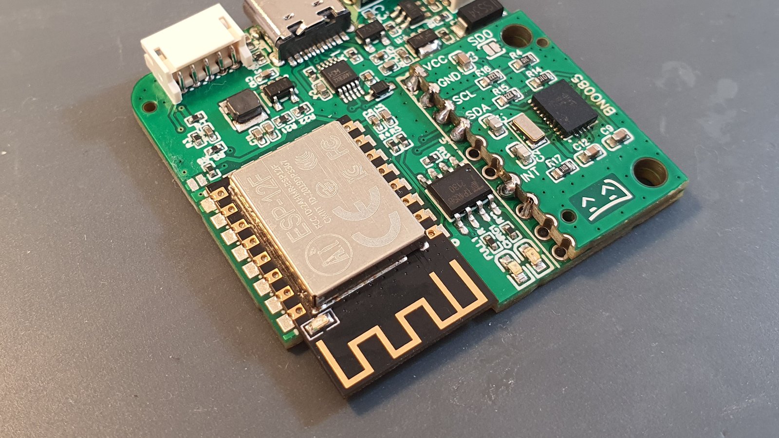 An assembled prototype of SlimeVR board, Revision 9.