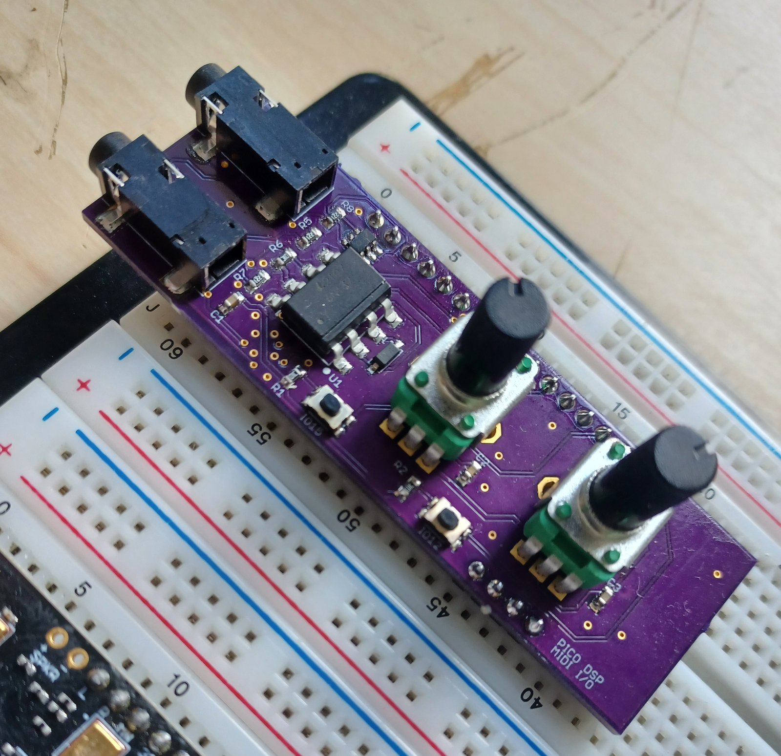 A freshly soldered MIDI adaptor expansion board, ready for testing. The PCB is from OSH Park.